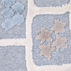 Pastel shapes on gray background in Veiled Dreams Kids Woven Rug for playful spaces.
