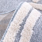 Soft textured Veiled Dreams Kids Woven Rug in pastel colors for cozy play areas.