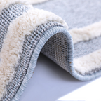 Soft gray Veiled Dreams Kids Woven Rug with plush texture for cozy play areas.