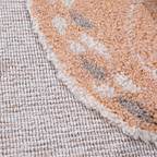 Close-up of Quiet Lullaby Deer Rug's soft texture and warm colors.