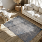 Abstract gray and blue rug enhancing modern living room decor