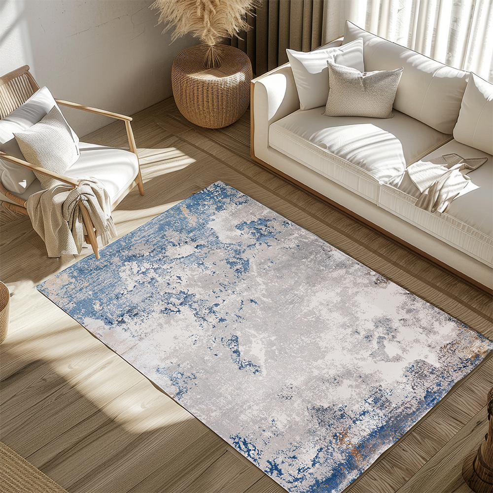 Sky Abstract Textured Rug in blue, gray, and cream in a stylish living room