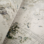 Nash abstract textured rug with gray and blue patterns, perfect for modern decor.