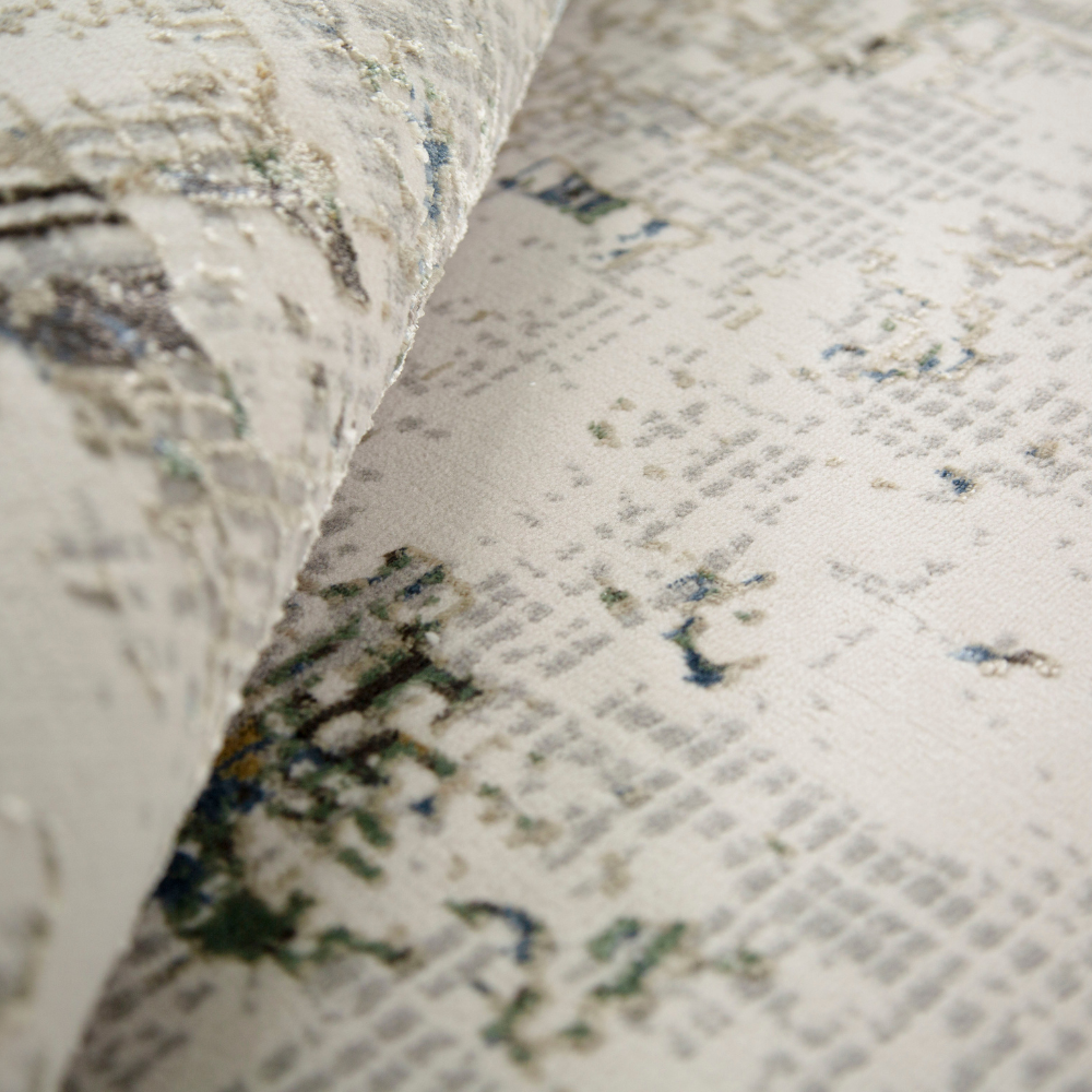 Nash abstract textured rug with gray and blue patterns, perfect for modern decor.