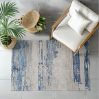 Juno Abstract Textured Rug in blue and gray, ideal for contemporary decor.