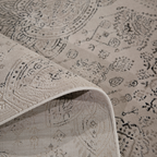 Finn Vintage Textured Rug in beige with intricate design, ideal for elegant home decor.