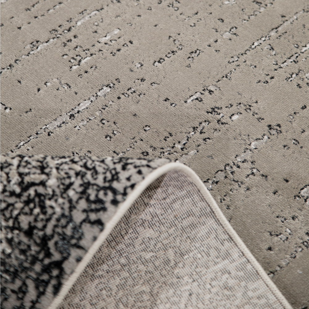 Zane Vintage Textured Rug with subtle patterns in soft gray hues for modern homes.