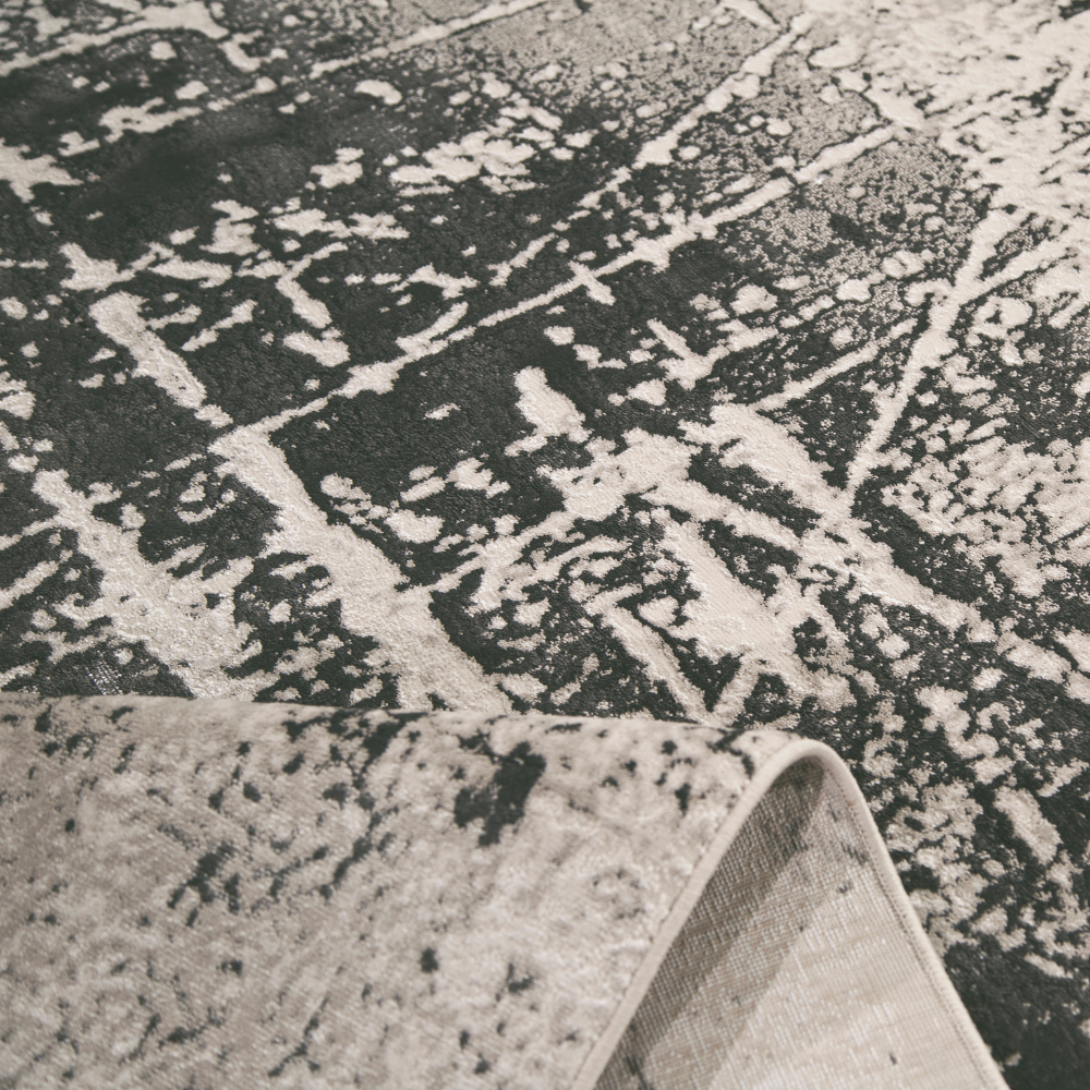 Stella Abstract Textured Rug featuring neutral tones and intricate patterns