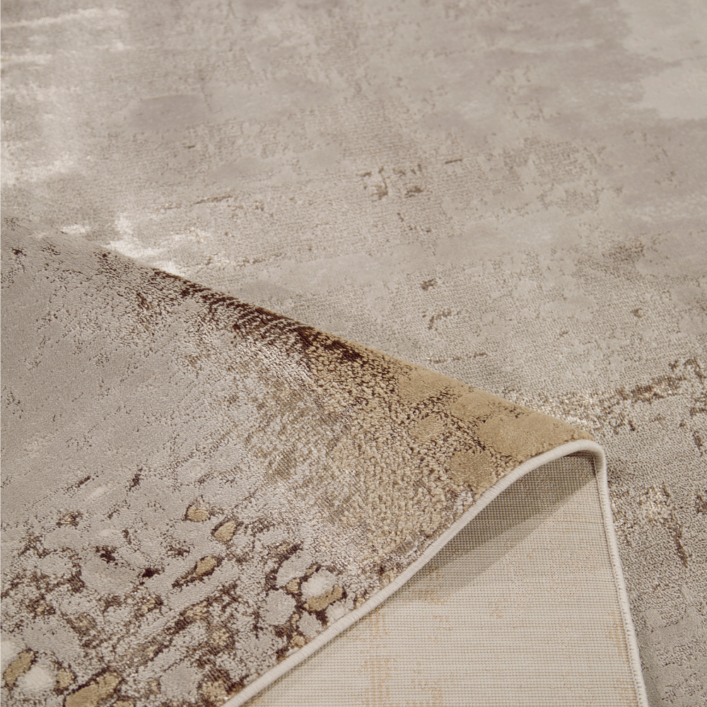 Close-up of Eden Abstract Textured Rug showcasing beige and taupe tones.