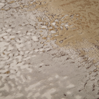 Eden Abstract Textured Rug in beige and taupe, suitable for contemporary home styling.
