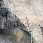 Sable Abstract Textured Rug in gray and cream, perfect for modern home styling.