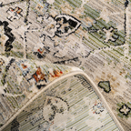 Wren geometric textured rug featuring green and beige floral patterns