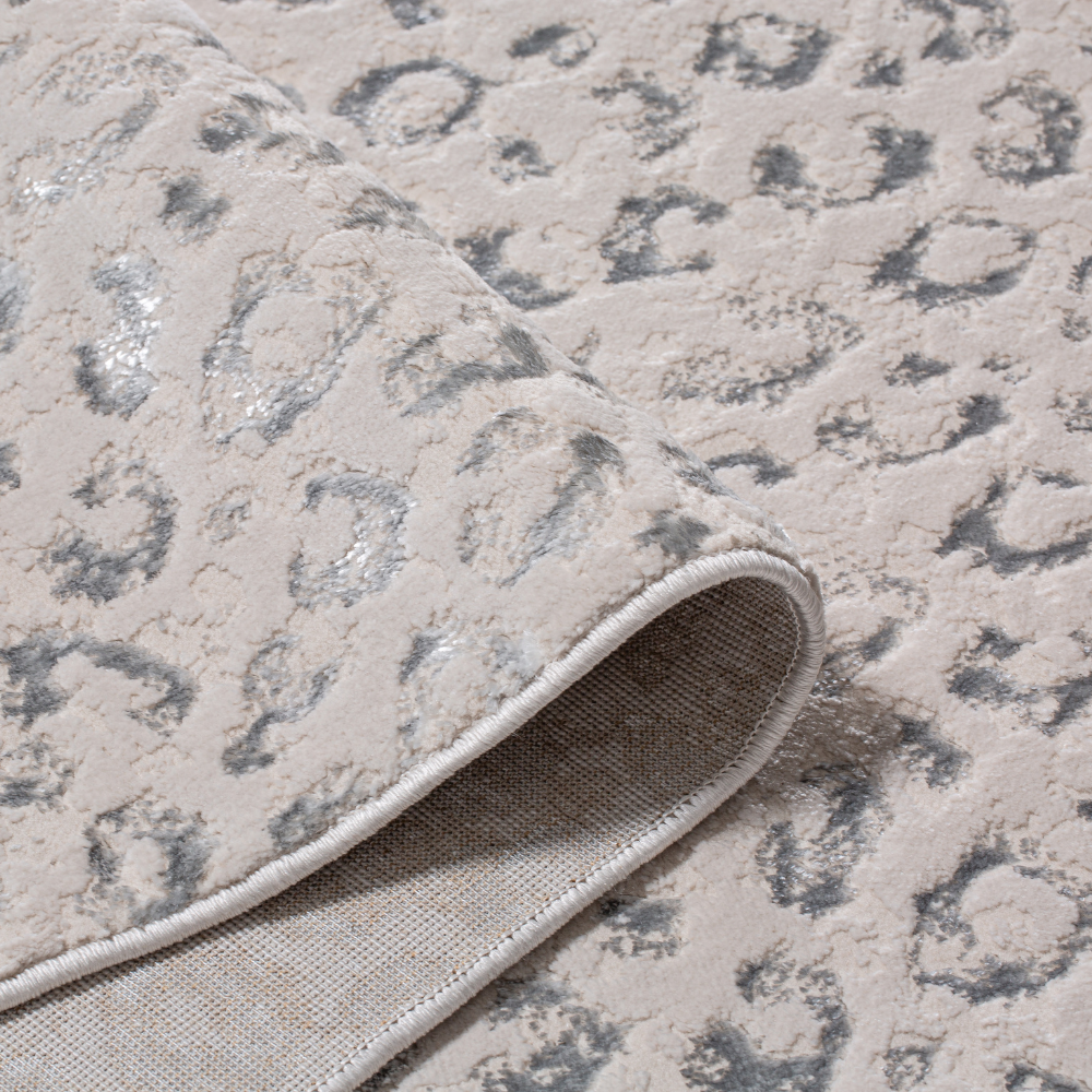 Stylish beige leopard print rug with soft texture for modern home decor