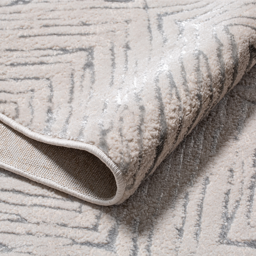 Close-up of washable indigo geometric rug with soft texture