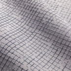 Textured Zuri Checkered Rug in light gray tones for stylish home decor.