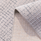 Zuri Checkered Textured Rug detail in soft gray, ideal for contemporary home design.
