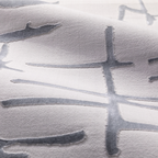 Gideon Strip Textured Rug featuring elegant grey lines on a soft surface.