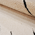 Close-up of Marlow Abstract Textured Rug, cream and black, modern washable design