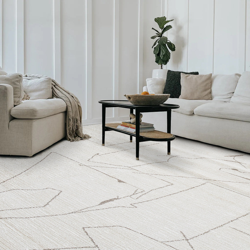 Aeron Abstract Textured Rug in cream with geometric pattern, ideal for stylish living rooms.