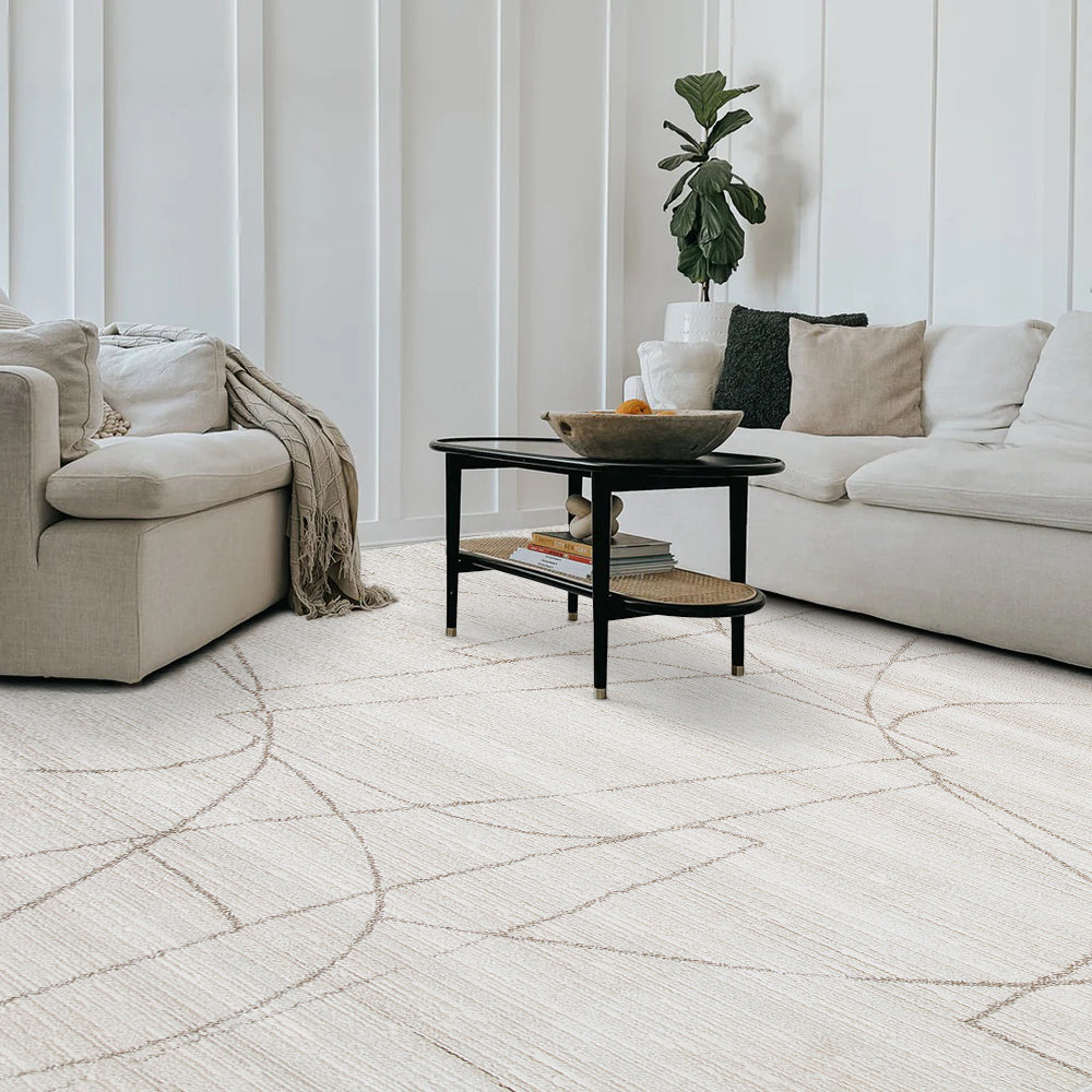 Thalion abstract rug in neutral tones, enhancing a cozy living room decor.