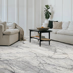 Drystan abstract gray and white marble rug in a modern living room setting
