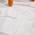 Cream Lorien Stripe Textured Rug with soft texture, perfect for modern home decor.