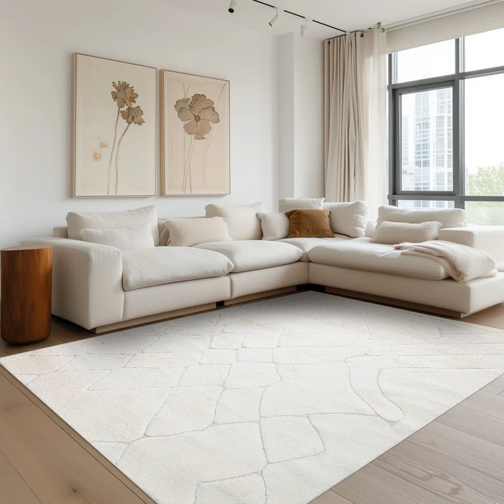 Cream Nyx geometric rug enhancing modern living room aesthetics.