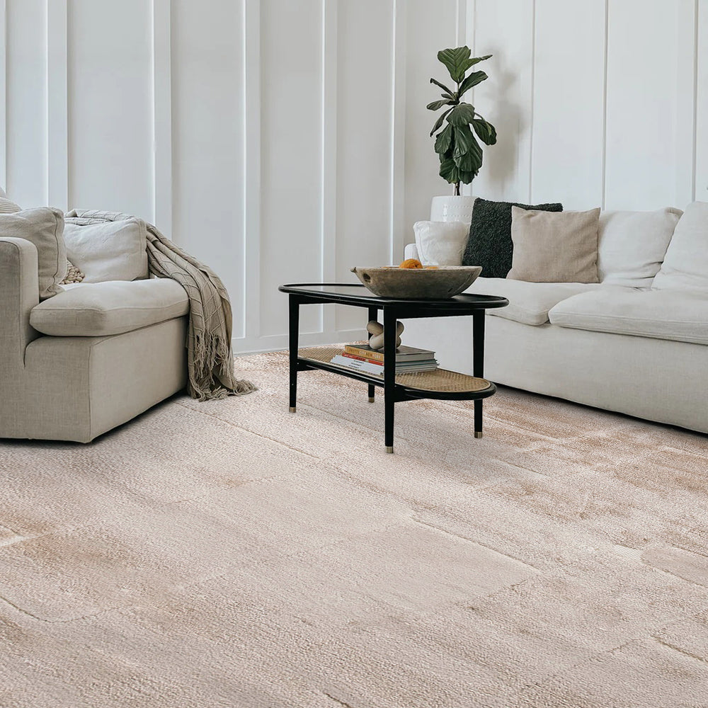 Beige geometric rug adding elegance to modern living room decor