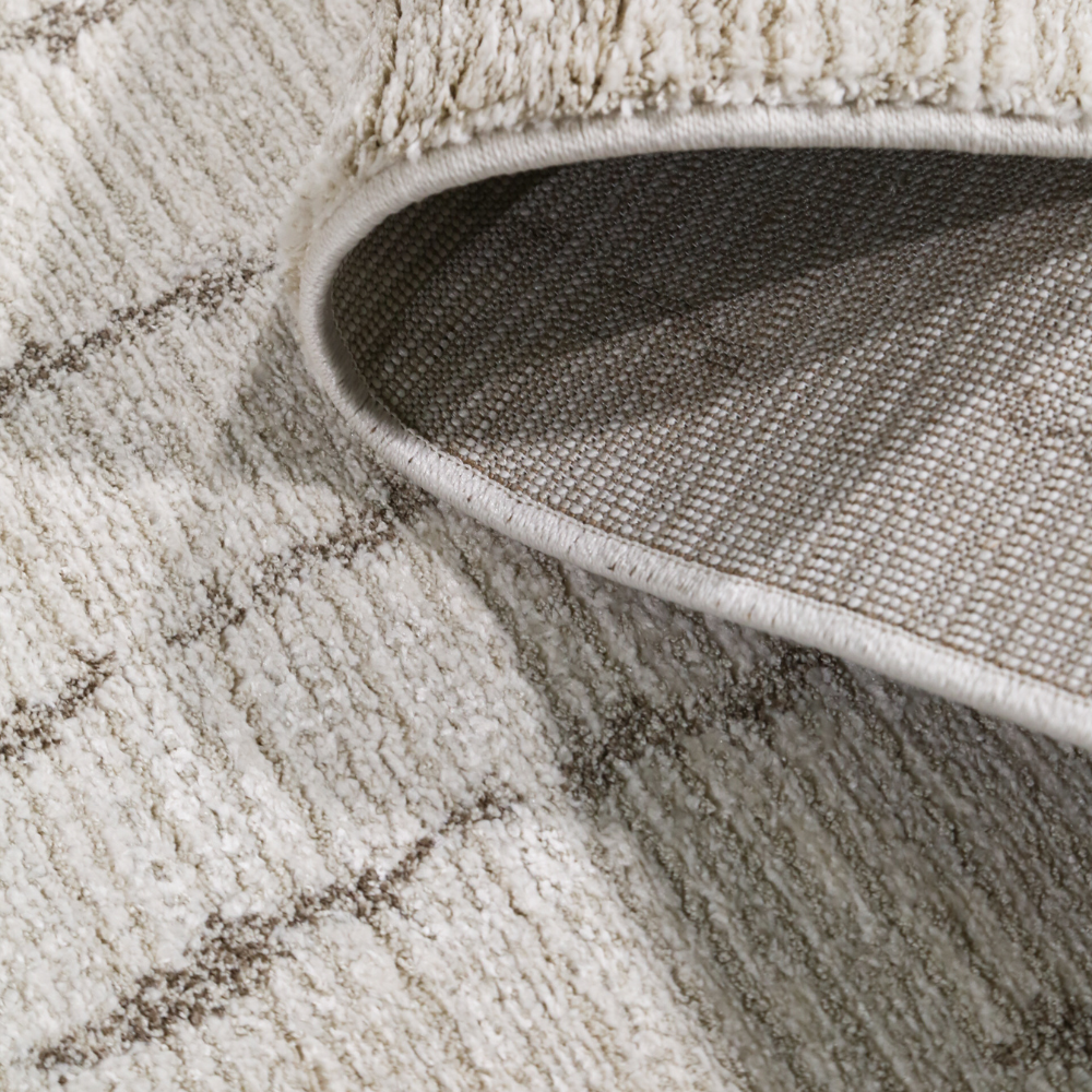 Iskander Stripe Textured Rug in cream with soft texture and subtle stripe design.