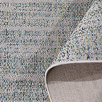 Stylish light gray braided rug with blue accents for home interiors