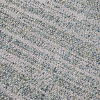 Light gray braided rug with blue and green accents for modern home decor