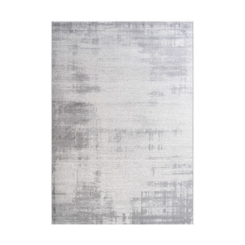 Silvra modern textured area rug in light gray color.